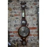 An inlaid mahogany reproduction stick barometer by Thomas Wright of Sarum,