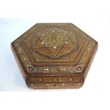 An Islamic parquetry-inlaid octagonal box with hinged lid, 36 cm