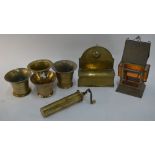 Two bronze mortars, to/w two brass mortars, a brass candle-box,