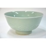 A pale Chinese celadon monochrome bowl; the base with underglaze blue six-character Guangxu mark,
