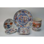Four pieces of Chinese Imari including: an oval spoon tray 14 cm diameter; and a circular dish,