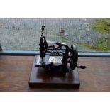 A Victorian James Galloway Weir patent sewing machine, decorated in gilt and black,