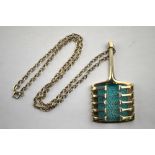 David Anderson Norway - a silver pendant of wrap around style over turquoise enamel