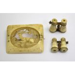 Two bone Stanhopes as miniature binoculars, to/w a bone brooch,