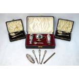 A cased silver condiment set, Viners Ltd., Sheffield 1941, to/w two cased silver infant spoon and