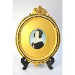 A Victorian oval portrait miniature on ivory of a lady,
