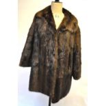 A lady's dark brown fur coat, 53 cm across chest
