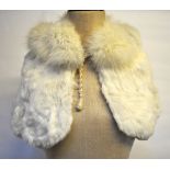 A child's white rabbit fur cape, a beaver fur hat and collar, to/w a mink fur hat and tippet