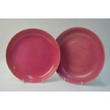 A pair of Chinese pink monochrome, circular dishes, 24 cm diameter,