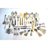 A small quantity of electroplated flatware and cutlery, napkin rings, etc.