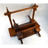 A 19th century wood-block book-binder's press,