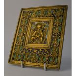 A pre-Revolutionary Russian enamelled brass icon, cast and chased in relief with Apostles,