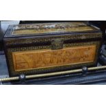 A small Chinese camphor wood chest of rectangular form with hinged lid and metal fittings,