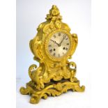 A 19th century French ormolu rococo mantel clock, the movement by Dupont of Paris striking the hours