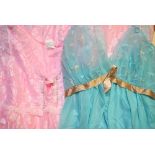 A box of Victorian cotton nightgowns, infants' bed coverlets, later 1950s negligees etc.