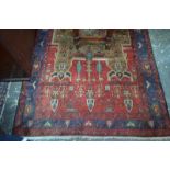 A Persian Hamadan rug, the geometric design in multi-colours, 325 x 160 cm