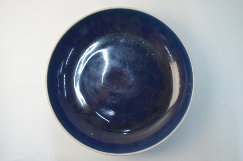A large Chinese blue monochrome circular dish with unglazed base, 34 cm diameter, - Image 3 of 4