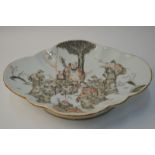 A Chinese grisaille decorated dish of rounded, oval form,