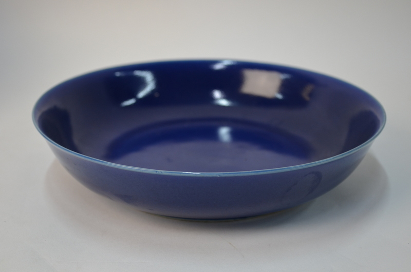 A pair of Chinese blue monochrome saucer dishes, 21 cm diameter. - Image 3 of 4