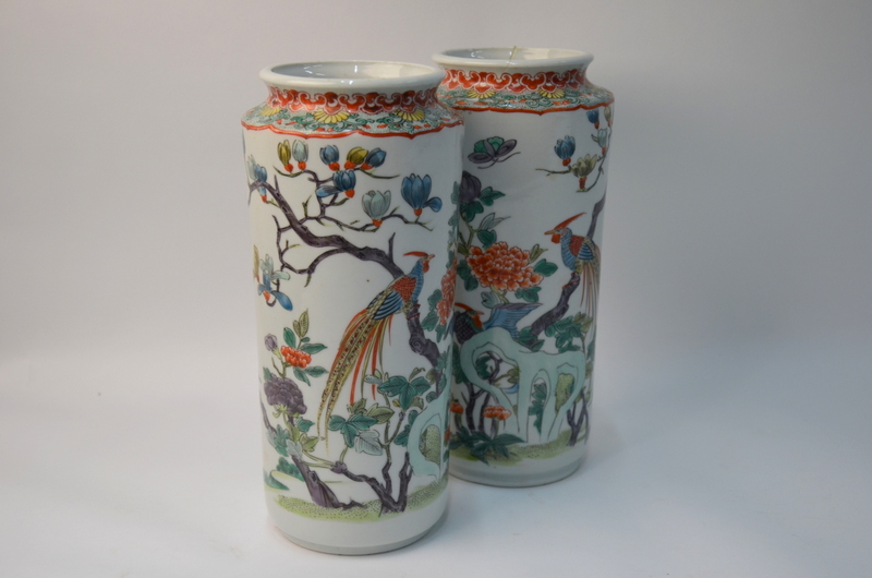 A pair of Chinese cylindrical vases, decorated in coloured enamels with birds,