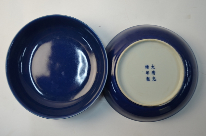 A pair of Chinese blue monochrome saucer dishes; 21 cm diameter. - Image 3 of 4