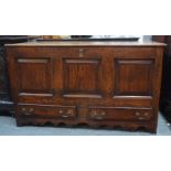 An 18th century oak and walnut crossbanded mule chest with panelled front and sides and two base