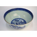 An early 19th century pearlware punch bowl decorated with blue and white pagoda landscapes, 32.