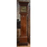 An early 18th century burr walnut and crossbanded longcase clock, the modified eight-day movement