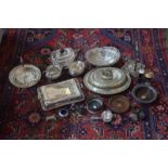 An electroplated three-piece tea service, two entree dishes and covers, oval fruit basket,