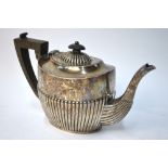 An Edwardian silver oval half-reeded teapot, maker's mark rubbed, Birmingham 1904, 16.8 oz gross