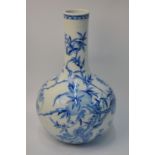 A Chinese blue and white vase decorated with the Daoist theme of Bats and Peaches; 32 cm high;