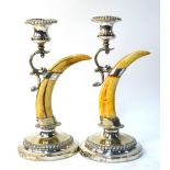 A pair of Victorian electroplated candlesticks with boars' tusk stems, Joseph Rogers & Sons,