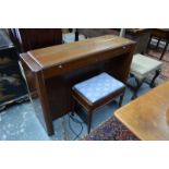 An Eavestaff Pianette 'Minipiano', mahogany with chrome mounts,