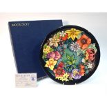 A Moorcroft contemporary charger decorated with the 'Carousel' pattern after Rachel Bishop, no.