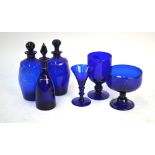 Two early 19th century Bristol blue glass sprit decanters, both gilded and inscribed 'Brandy' and '