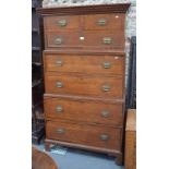 An unusual Georgian oak chest of two short and five long drawers with rosewood crossbanded fronts,