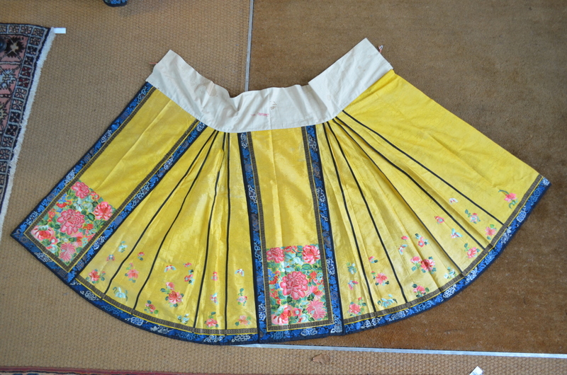 A Chinese imperial-yellow ground textile skirt decorated with floral designs, - Image 5 of 5