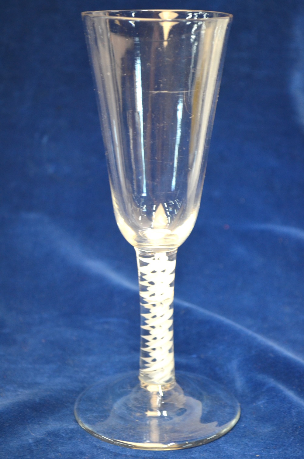 An 18th century ale glass, rounded funnel bowl, multiple spiral opaque twist stem, domed foot and - Image 3 of 4