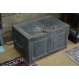 A 19th century heavy cast iron strong-box with loop handles,