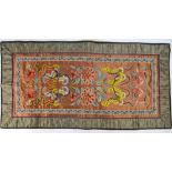 A rectangular Chinese textile, decorated with stylized invertebrates and floral designs, 65 x 33 cm,