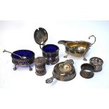 A silver sauce boat, London 1966, to/w a three-piece pierced silver condiment set with blue glass