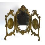 A French brass toilet mirror with folding frame, the frosted glass side panels mounted with