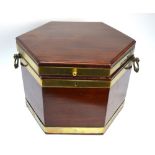 A 19th century mahogany and brass-bound octagonal cellaret with hinged lid,