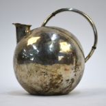 A Continental Art Deco hot water jug of spherical form with insulated loop handle, stamped .935,