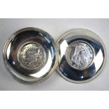 Two Maltese white metal pin-dishes, each loose-mounted with a 30 Tari piece,