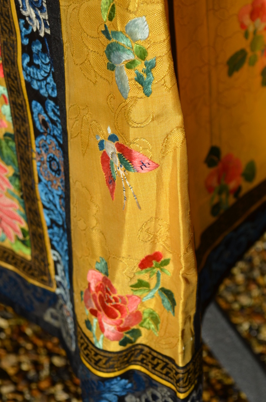 A Chinese imperial-yellow ground textile skirt decorated with floral designs, - Image 4 of 5