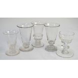 A collection of four jelly glasses and a sweetmeat glass, one with a lemon squeezer octagonal