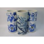 A pair of Chinese cylindrical blue and white hat stands,