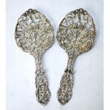 Two Victorian ornately pierced serving spoons, William Comyns & Sons, London 1894 (one with repaired