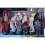 A set of nine painted composite figures